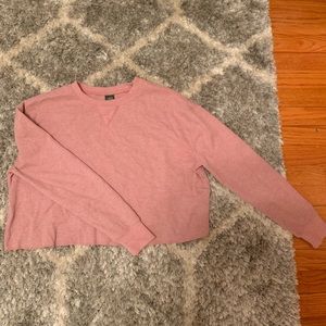 This is a long sleeve cropped shirt.